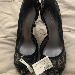 Black lace and nude heels.